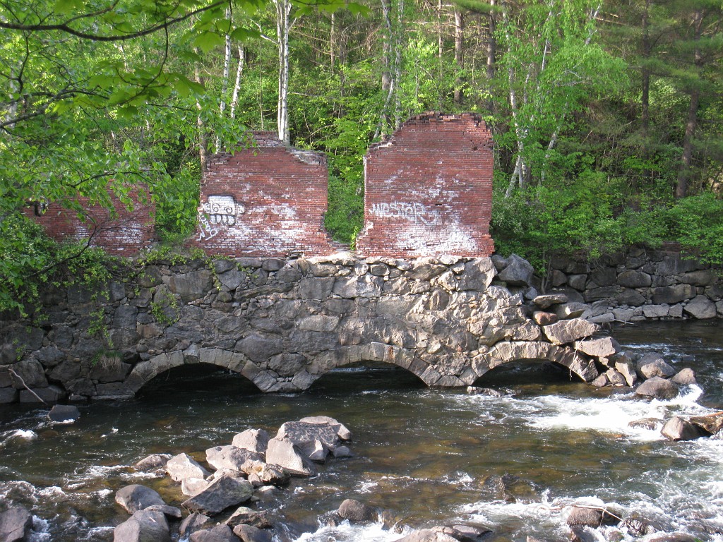 Tilton NH Rail Trail 2010 0325.jpg - Winnipesaukee River Trail, Franklin New HampshireTrestle View ParkInterested in taking a walk or bike ride on a scenic historic trail close to the downtowns of the twin rivers area, yet with the feel of wilderness. A 3 mile trail parallels the Winnipesauke river and passes the historic Sulphite upside down covered bridge believed to be the only one in the country and listed on the national register of historic places. You will also view mill ruins and remaining portions of dams that tell the history of the 5 mills that operated on this river in the mid 19th century.